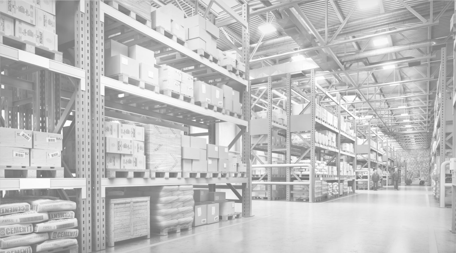 Long warehouse aisles stacked high with pallets